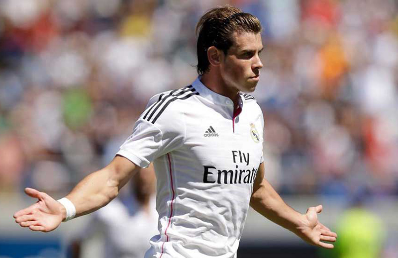 Gareth Bale bắt đầu nuôi tóc dài và bờm mái từ khi chuyển sang Real Madrid